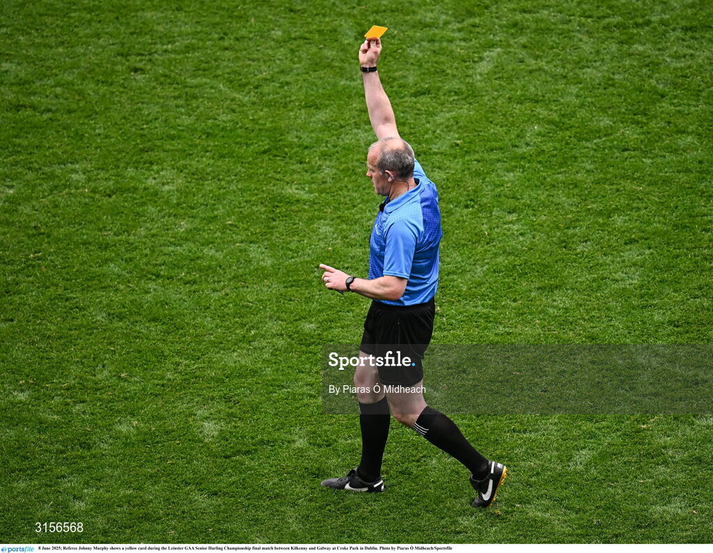 8 June 2025; Referee Johnny Murphy shows a yellow card during the Leinster GAA Senior Hurling Championship final match between Kilkenny and Galway at Croke Park in Dublin. Photo by Piaras Ó Mídheach/Sportsfile