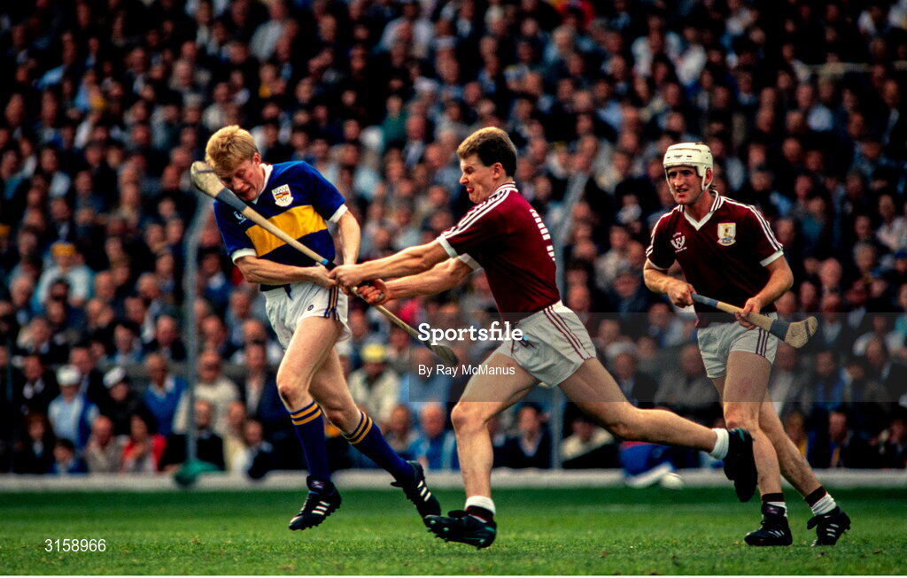 4 September 1988; Aidan Ryan of Tipperary in action against Pete Finnerty, centre, and Tony Keady of Galway during the All-Ireland Senior Hurling Championship Final match between Galway and Tipperary at Croke Park in Dublin. Photo by Ray McManus/Sportsfile