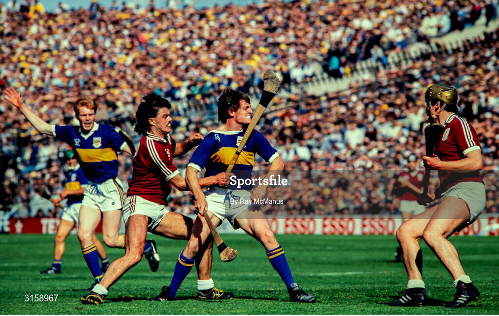 4 September 1988; Nicky English of Tipperary in action against Gerry McInerney, left, and Conor Hayes of Galway during the All-Ireland Senior Hurling Championship Final match between Galway and Tipperary at Croke Park in Dublin. Photo by Ray McManus/Sportsfile