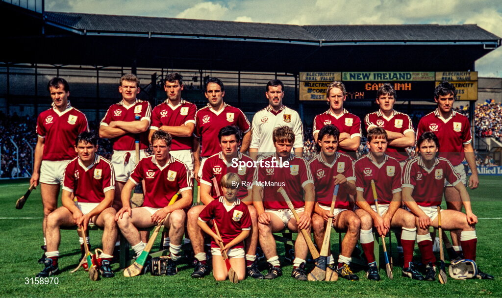 4 September 1988; The Galway team, back, from left, Brendan Lynskey, Pete Finnerty, Michael Coleman, Anthony Cunningham, John Commins, Tony Keady, Martin Naughton and Pat Malone, with, front, from left, Michael McGrath, Joe Cooney, Conor Hayes, Sylvie Linnane, Gerry McInerney, Ollie Kilkenny and Eanna Ryan, with the mascot Nigel Murray before the All-Ireland Senior Hurling Championship Final match between Galway and Tipperary at Croke Park in Dublin. Photo by Ray McManus/Sportsfile