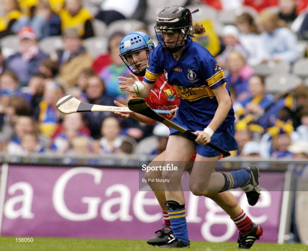 19 September 2004; Suzanne Kelly, Tipperary, in action against Jennifer O'Leary, Cork. Foras na Gaeilge Senior Camogie Championship All-Ireland Final, Tipperary v Cork, Croke Park, Dublin. Picture credit; Pat Murphy / SPORTSFILE