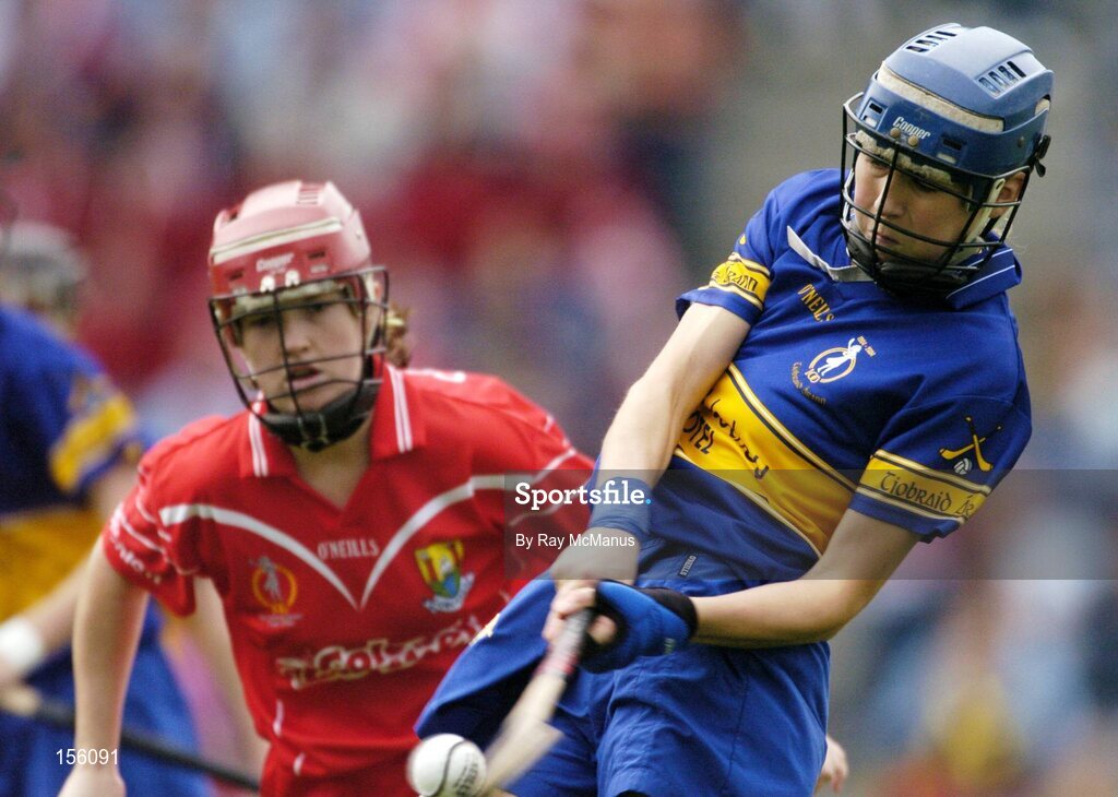 19 September 2004; Una O'Dwyer, Tipperary, in action against Elaine Burke, Cork. Foras na Gaeilge Senior Camogie Championship All-Ireland Final, Tipperary v Cork, Croke Park, Dublin. Picture credit; Ray McManus / SPORTSFILE