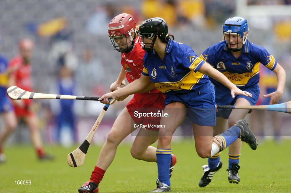 19 September 2004; Elaine Burke, Cork, in action against Ciara Gaynor, Tipperary. Foras na Gaeilge Senior Camogie Championship All-Ireland Final, Tipperary v Cork, Croke Park, Dublin. Picture credit; Ray McManus / SPORTSFILE