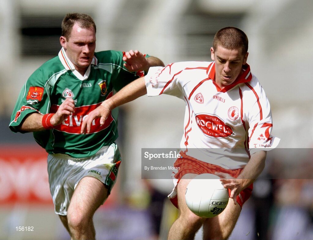 7 August 2004; Philip Jordan, Tyrone, in action against Fergal Costello, Mayo. Bank of Ireland All-Ireland Senior Football Championship Quarter Final, Mayo v Tyrone, Croke Park, Dublin. Picture credit; Brendan Moran / SPORTSFILE