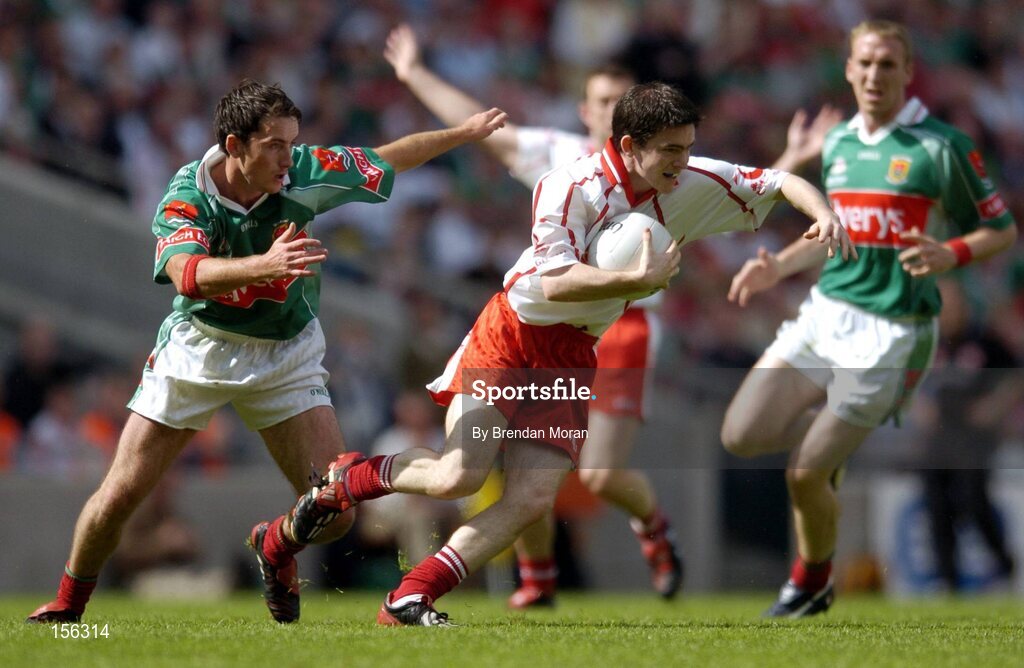 7 August 2004; Mark Harte, Tyrone, in action against Fergal Costello, Mayo. Bank of Ireland All-Ireland Senior Football Championship Quarter Final, Mayo v Tyrone, Croke Park, Dublin. Picture credit; Brendan Moran / SPORTSFILE