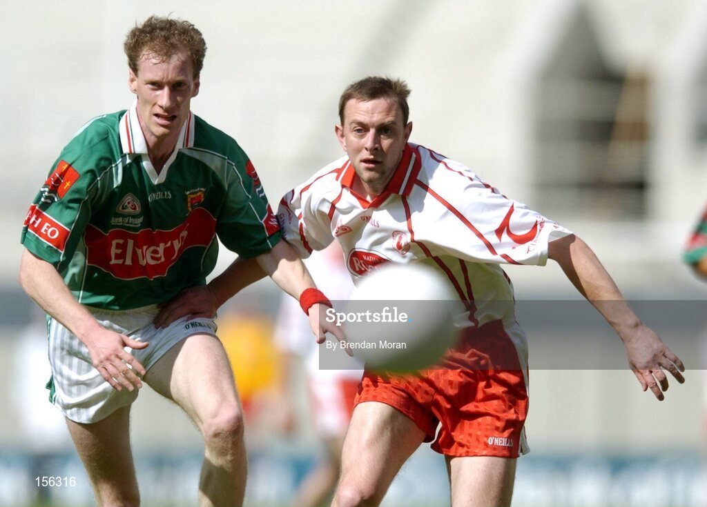 7 August 2004; James Nallen, Mayo, in action against Gerard Cavlan, Tyrone. Bank of Ireland All-Ireland Senior Football Championship Quarter Final, Mayo v Tyrone, Croke Park, Dublin. Picture credit; Brendan Moran / SPORTSFILE