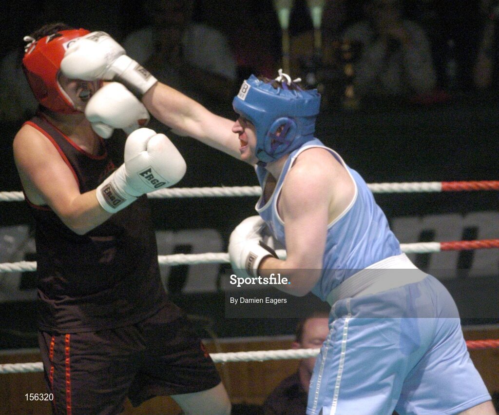 25 September 2004; Jonathan Magee, right, in action against Quentin Hann. Charity boxing match, Jonathan Magee v Quentin Hann, National Stadium, Dublin. Picture credit; Damien Eagers / SPORTSFILE