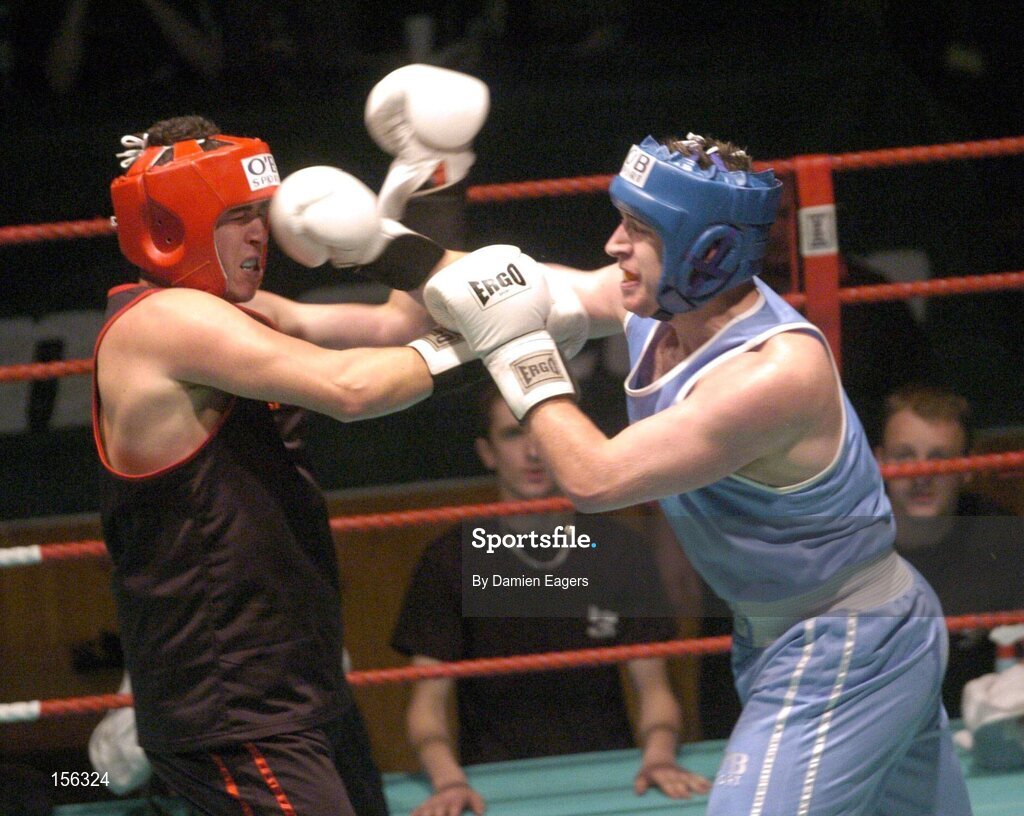 25 September 2004; Jonathan Magee, right,  in action against Quentin Magee. Charity boxing match, Jonathan Magee v Quentin Hann, National Stadium, Dublin. Picture credit; Damien Eagers / SPORTSFILE