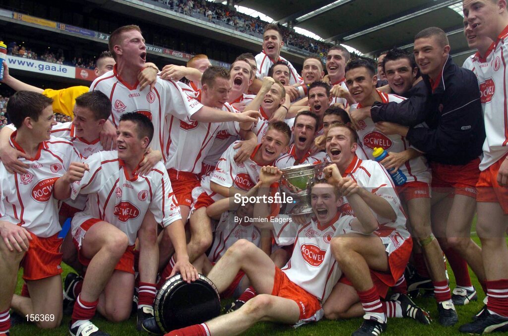 26 September 2004; The Tyrone squad celebrate after victory over Kerry. All-Ireland Minor Football Championship Final, Kerry v Tyrone, Croke Park, Dublin. Picture credit; Damien Eagers / SPORTSFILE *** Local Caption *** Any photograph taken by SPORTSFILE during, or in connection with, the 2004 All-Ireland Minor  Football Final which displays GAA logos or contains an image or part of an image of any GAA intellectual property, or, which contains images of a GAA player/players in their playing uniforms, may only be used for editorial and non-advertising purposes.  Use of photographs for advertising, as posters or for purchase separately is strictly prohibited unless prior written approval has been obtained from the Gaelic Athletic Association.