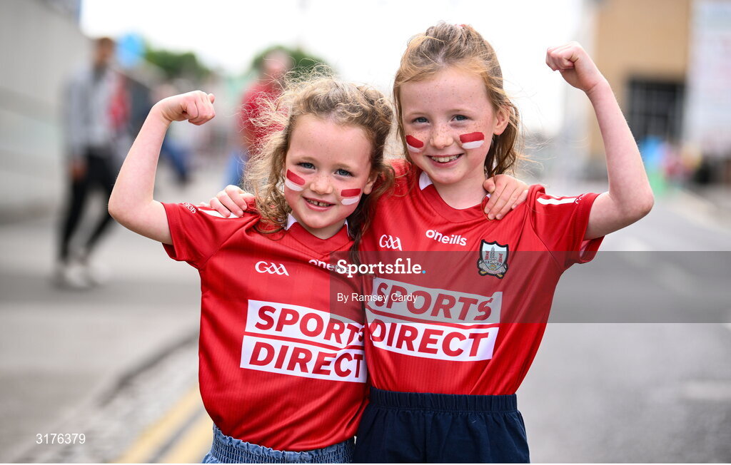 5 July 2025; Cork supporters Eve, age 6, and Lily O'Donovan, age 7, from Carrigaline, before the GAA Hurling All-Ireland Senior Championship semi-final match between Cork and Dublin at Croke Park in Dublin. Photo by Ramsey Cardy/Sportsfile
