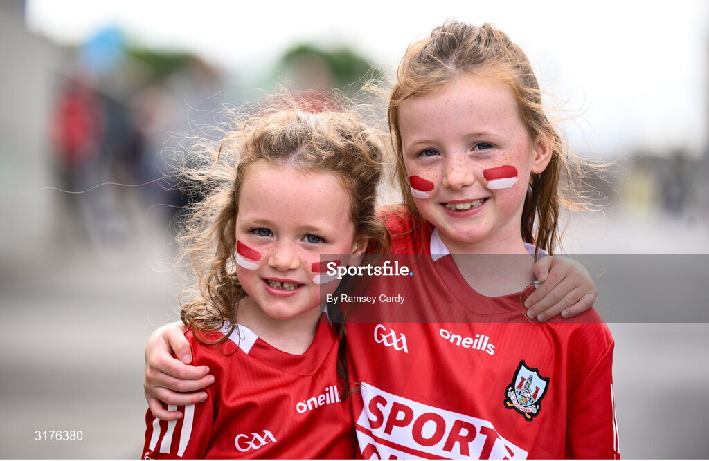 5 July 2025; Cork supporters Eve, age 6, and Lily O'Donovan, age 7, from Carrigaline, before the GAA Hurling All-Ireland Senior Championship semi-final match between Cork and Dublin at Croke Park in Dublin. Photo by Ramsey Cardy/Sportsfile