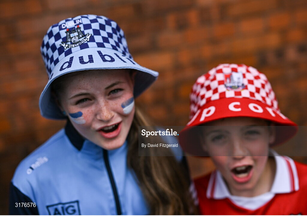 5 July 2025; Cousins, Dublin supporter Aoife Barry, age 11, and Cork supporter Lorcan Donovan, age 9, arrive before the GAA Hurling All-Ireland Senior Championship semi-final match between Cork and Dublin at Croke Park in Dublin. Photo by David Fitzgerald/Sportsfile