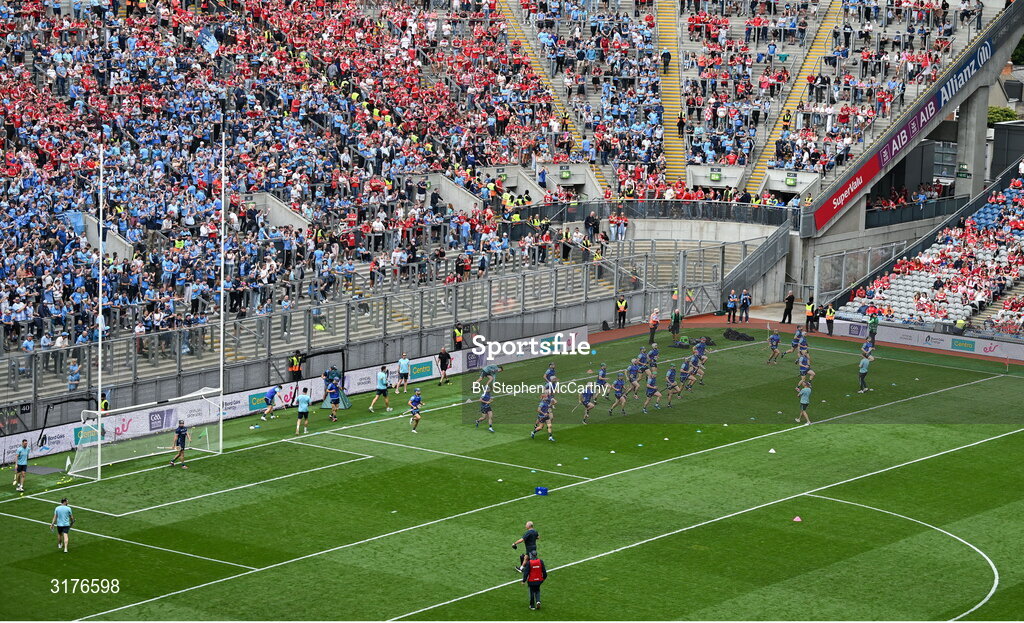 5 July 2025; Dublin players warm-up in front of Hill 16 before the GAA Hurling All-Ireland Senior Championship semi-final match between Cork and Dublin at Croke Park in Dublin. Photo by Stephen McCarthy/Sportsfile