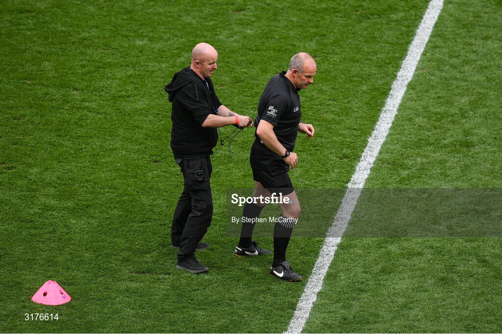 5 July 2025; Referee Johnny Murphy has his radio technology adjusted before the GAA Hurling All-Ireland Senior Championship semi-final match between Cork and Dublin at Croke Park in Dublin. Photo by Stephen McCarthy/Sportsfile