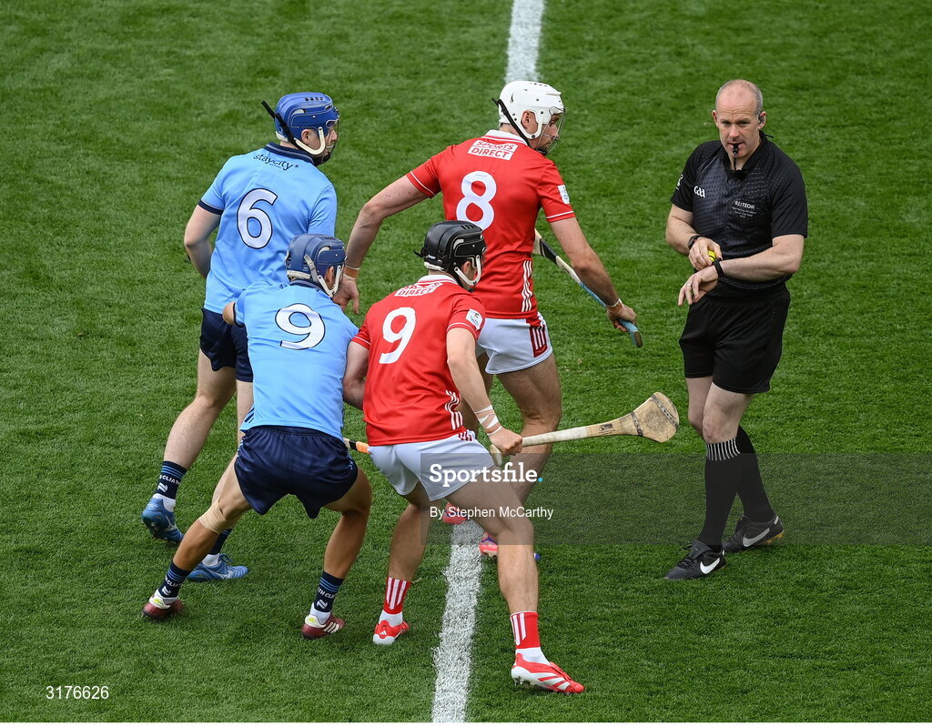 5 July 2025; Referee Johnny Murphy prepares to throw in the sliothar for the GAA Hurling All-Ireland Senior Championship semi-final match between Cork and Dublin at Croke Park in Dublin. Photo by Stephen McCarthy/Sportsfile