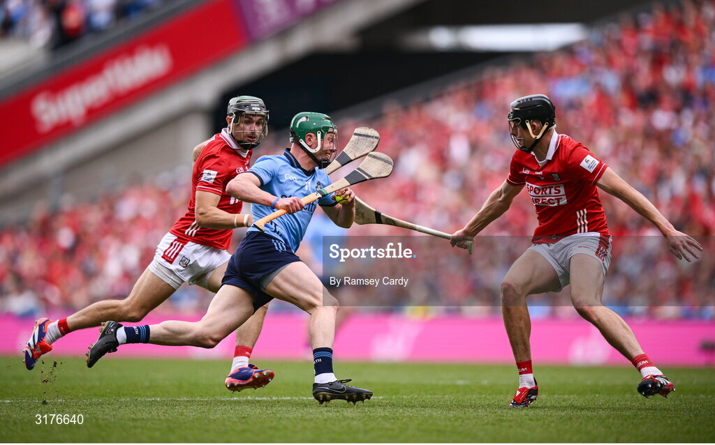 5 July 2025; Fergal Whitely of Dublin in action against Mark Coleman, left, and Robert Downey of Cork during the GAA Hurling All-Ireland Senior Championship semi-final match between Cork and Dublin at Croke Park in Dublin. Photo by Ramsey Cardy/Sportsfile