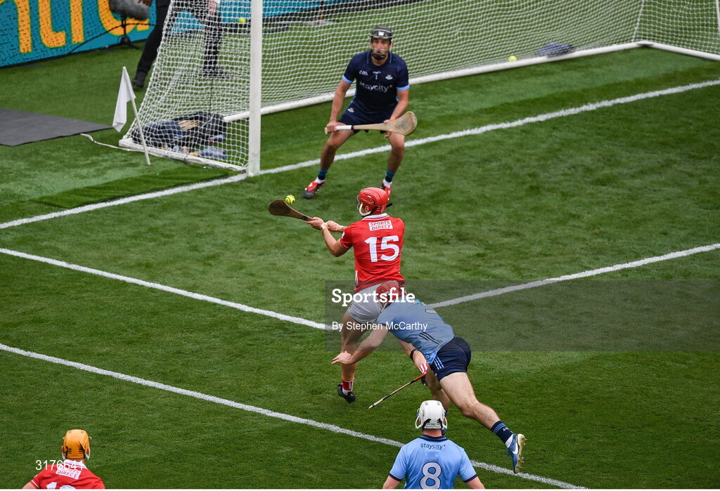 5 July 2025; Brian Hayes of Cork shoots to score his side's first goal past Dublin goalkeeper Sean Brennan during the GAA Hurling All-Ireland Senior Championship semi-final match between Cork and Dublin at Croke Park in Dublin. Photo by Stephen McCarthy/Sportsfile
