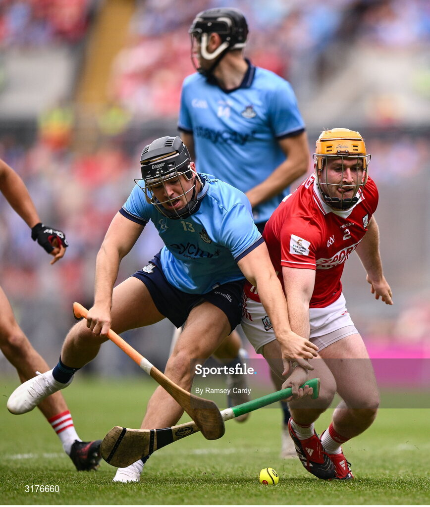 5 July 2025; Sean Currie of Dublin in action against Niall O'Leary of Cork during the GAA Hurling All-Ireland Senior Championship semi-final match between Cork and Dublin at Croke Park in Dublin. Photo by Ramsey Cardy/Sportsfile