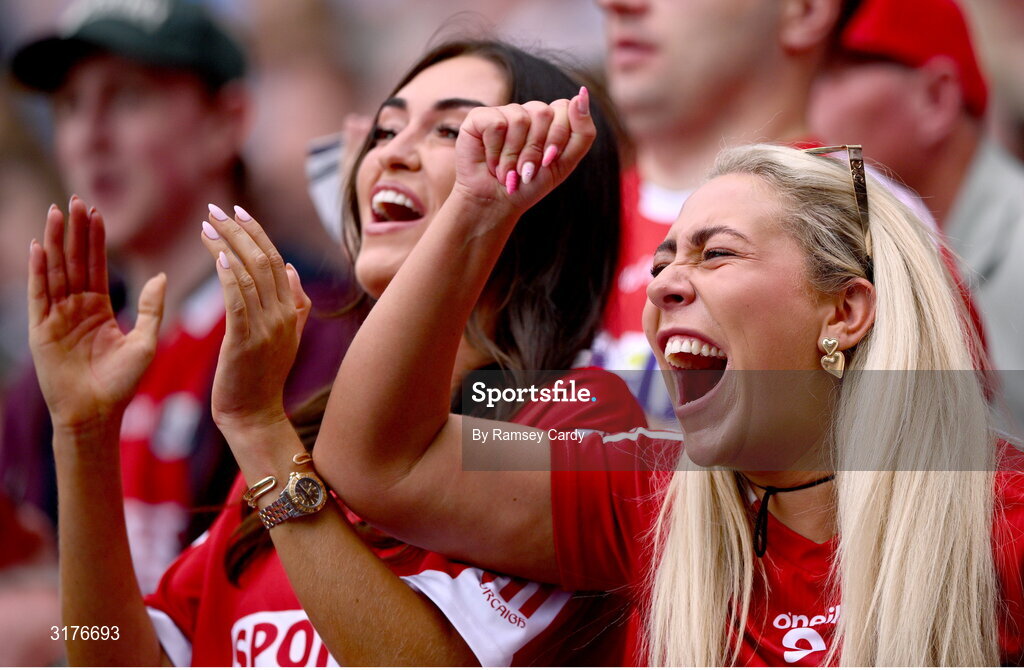 5 July 2025; Cork supporters celebrate during the GAA Hurling All-Ireland Senior Championship semi-final match between Cork and Dublin at Croke Park in Dublin. Photo by Ramsey Cardy/Sportsfile