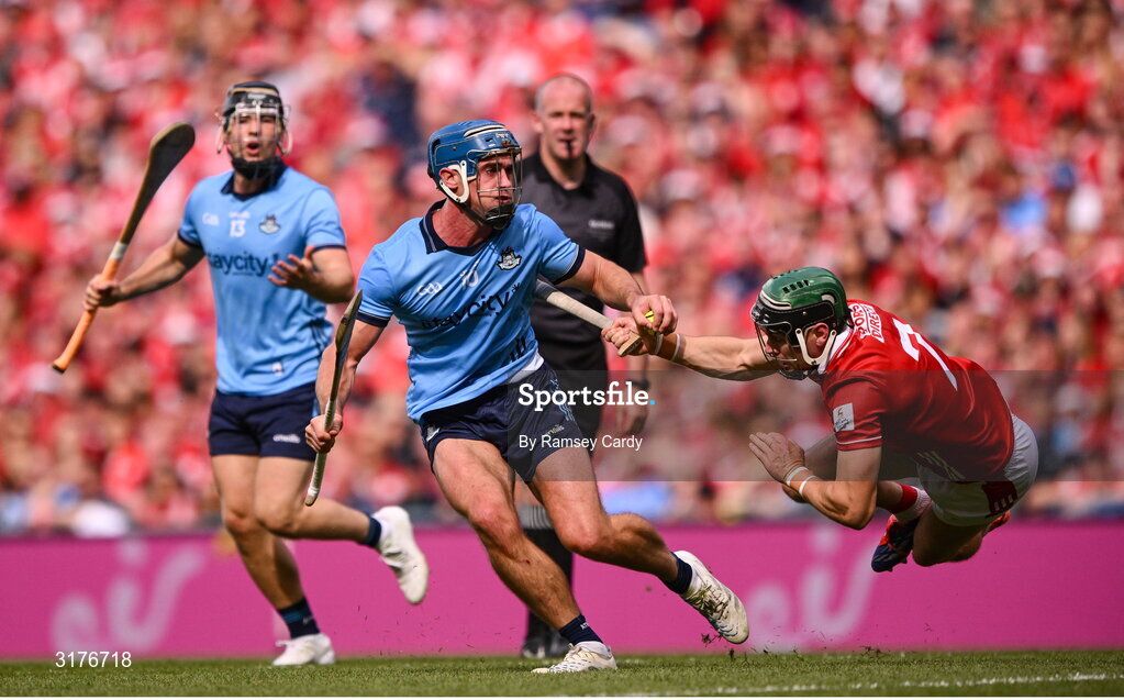 5 July 2025; Riain McBride of Dublin in action against Mark Coleman of Cork during the GAA Hurling All-Ireland Senior Championship semi-final match between Cork and Dublin at Croke Park in Dublin. Photo by Ramsey Cardy/Sportsfile
