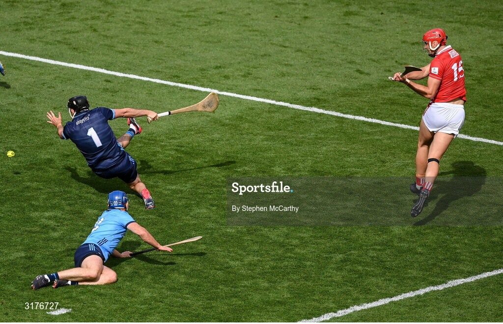 5 July 2025; Brian Hayes of Cork shoots to score his side's fourth goal past Dublin goalkeeper Sean Brennan during the GAA Hurling All-Ireland Senior Championship semi-final match between Cork and Dublin at Croke Park in Dublin. Photo by Stephen McCarthy/Sportsfile
