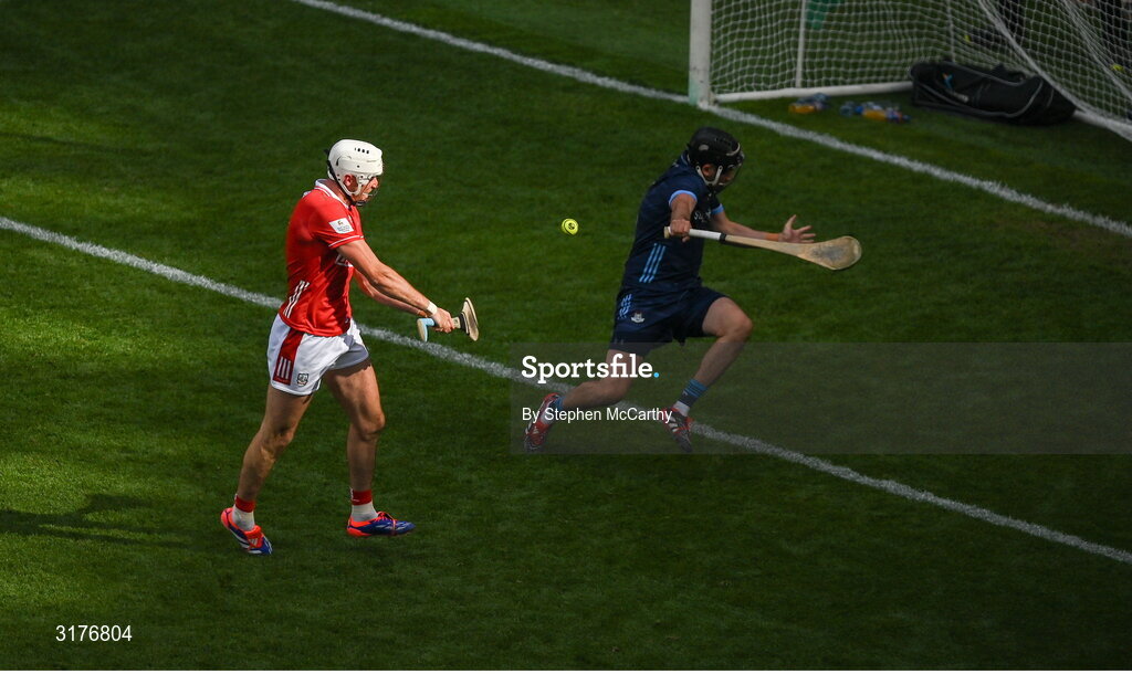5 July 2025; Tim O'Mahony of Cork scores his side's fifth goal past Dublin goalkeeper Sean Brennan during the GAA Hurling All-Ireland Senior Championship semi-final match between Cork and Dublin at Croke Park in Dublin. Photo by Stephen McCarthy/Sportsfile