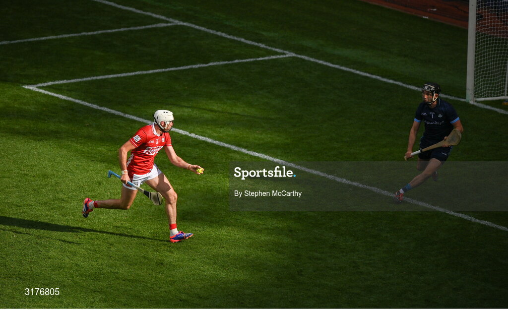 5 July 2025; Tim O'Mahony of Cork scores his side's fifth goal past Dublin goalkeeper Sean Brennan during the GAA Hurling All-Ireland Senior Championship semi-final match between Cork and Dublin at Croke Park in Dublin. Photo by Stephen McCarthy/Sportsfile