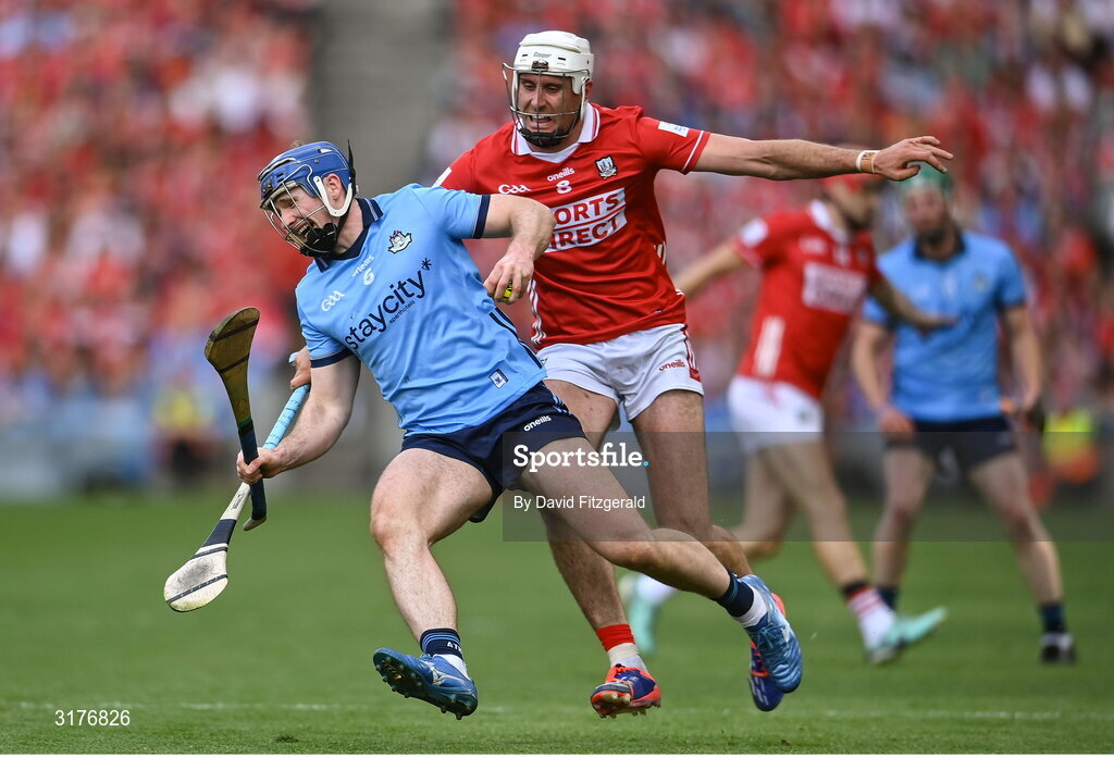 5 July 2025; Conor Burke of Dublin in action against Tim O'Mahony of Cork during the GAA Hurling All-Ireland Senior Championship semi-final match between Cork and Dublin at Croke Park in Dublin. Photo by David Fitzgerald/Sportsfile