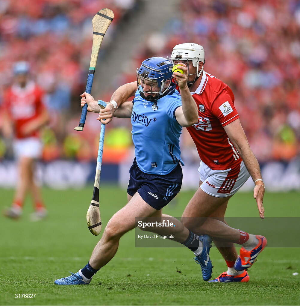 5 July 2025; Conor Burke of Dublin in action against Tim O'Mahony of Cork during the GAA Hurling All-Ireland Senior Championship semi-final match between Cork and Dublin at Croke Park in Dublin. Photo by David Fitzgerald/Sportsfile
