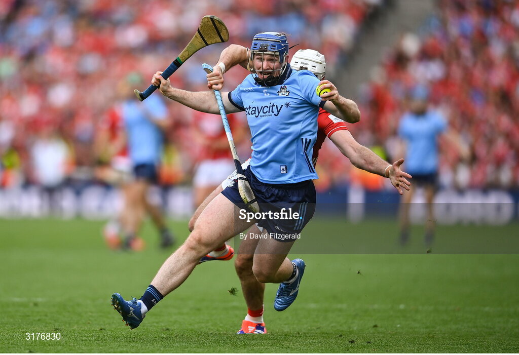 5 July 2025; Conor Burke of Dublin in action against Tim O'Mahony of Cork during the GAA Hurling All-Ireland Senior Championship semi-final match between Cork and Dublin at Croke Park in Dublin. Photo by David Fitzgerald/Sportsfile