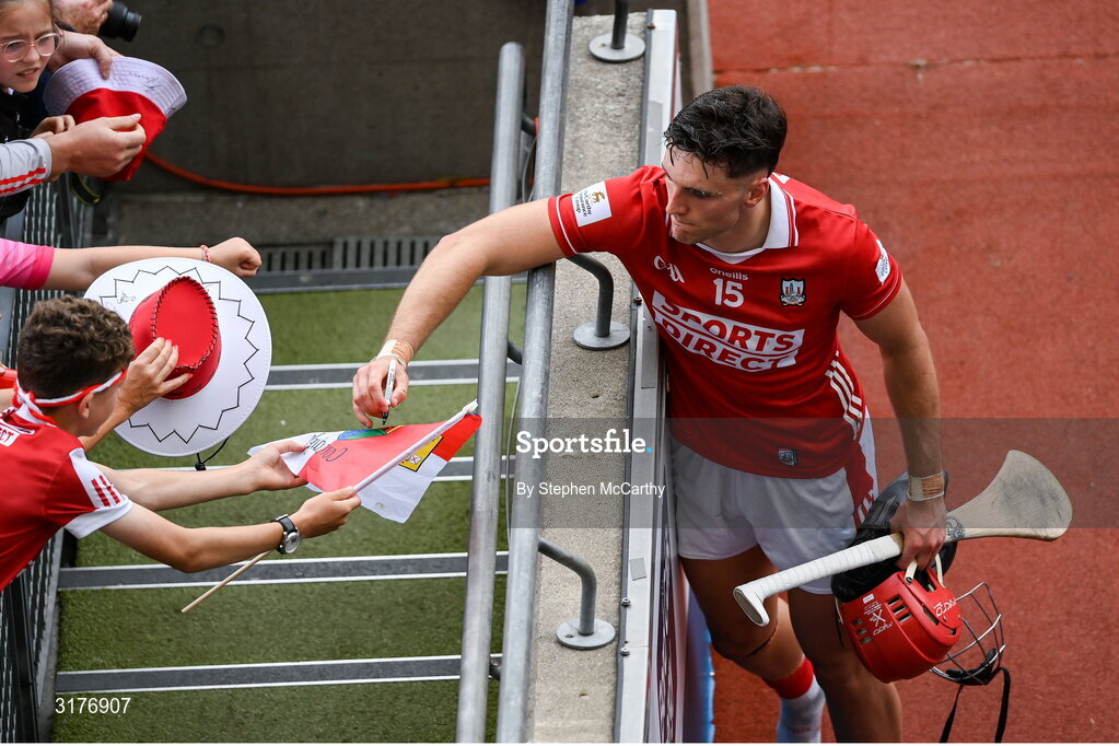 5 July 2025; Brian Hayes of Cork signs an autograph after the GAA Hurling All-Ireland Senior Championship semi-final match between Cork and Dublin at Croke Park in Dublin. Photo by Stephen McCarthy/Sportsfile