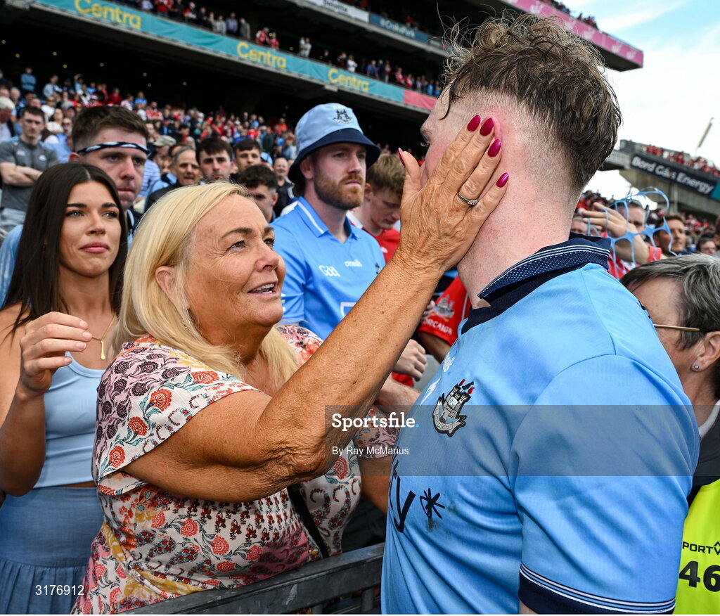 5 July 2025; Conor Burke of Dublin is concoled by his mother, Jackie, after the GAA Hurling All-Ireland Senior Championship semi-final match between Cork and Dublin at Croke Park in Dublin. Photo by Ray McManus/Sportsfile