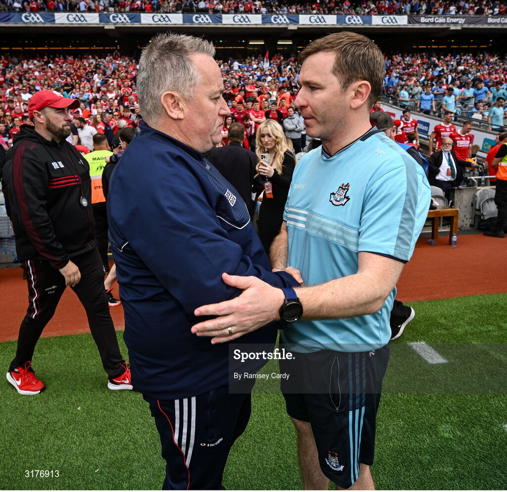 5 July 2025; Cork manager Pat Ryan, left, shakes hands with Dublin manager Niall Ó Ceallacháin after the GAA Hurling All-Ireland Senior Championship semi-final match between Cork and Dublin at Croke Park in Dublin. Photo by Ramsey Cardy/Sportsfile