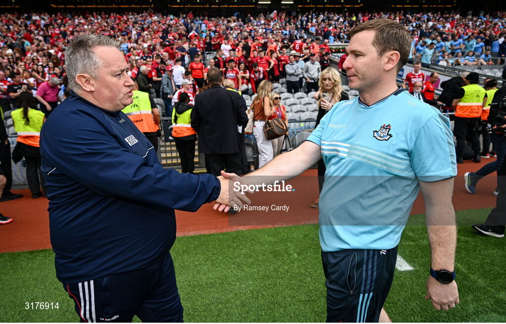 5 July 2025; Cork manager Pat Ryan, left, shakes hands with Dublin manager Niall Ó Ceallacháin after the GAA Hurling All-Ireland Senior Championship semi-final match between Cork and Dublin at Croke Park in Dublin. Photo by Ramsey Cardy/Sportsfile