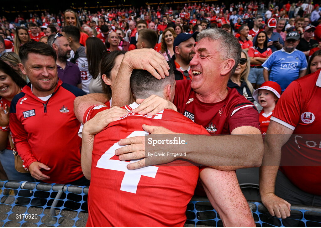 5 July 2025; Seán O'Donoghue of Cork celebrates with his parents Paddy and Yvonne after the GAA Hurling All-Ireland Senior Championship semi-final match between Cork and Dublin at Croke Park in Dublin. Photo by David Fitzgerald/Sportsfile