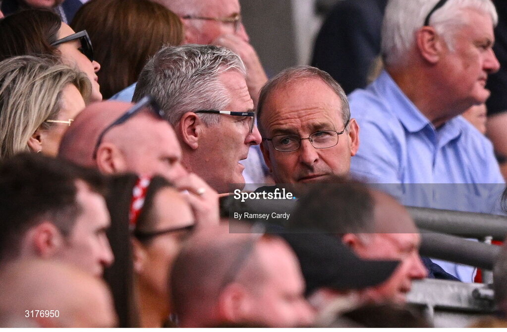 5 July 2025; Uachtarán Chumann Lúthchleas Gael Jarlath Burns, left, and An Taoiseach Míchéal Martin TD during the GAA Hurling All-Ireland Senior Championship semi-final match between Cork and Dublin at Croke Park in Dublin. Photo by Ramsey Cardy/Sportsfile
