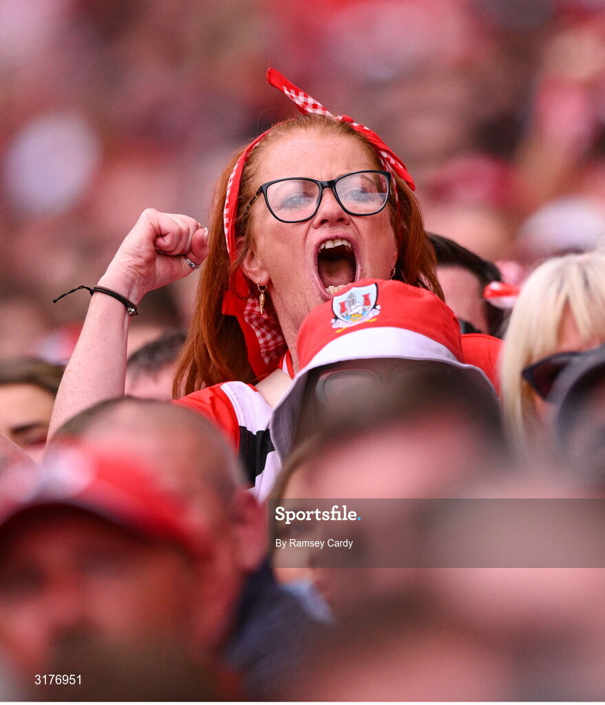 5 July 2025; A Cork supporter celebrates during the GAA Hurling All-Ireland Senior Championship semi-final match between Cork and Dublin at Croke Park in Dublin. Photo by Ramsey Cardy/Sportsfile