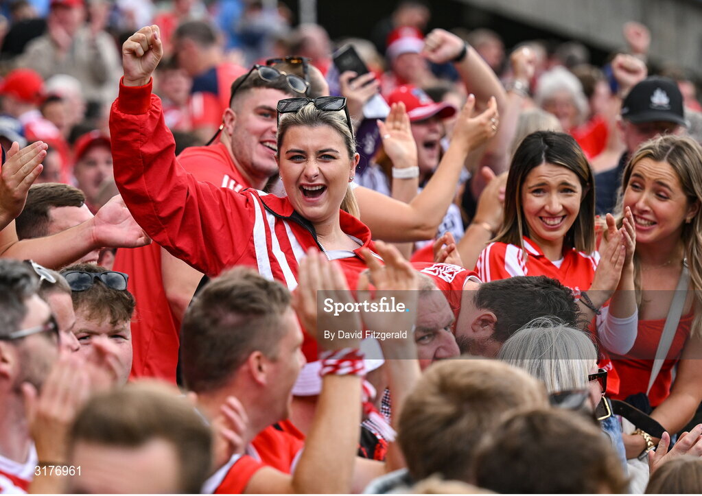 5 July 2025; Cork supporters celebrate a score during the GAA Hurling All-Ireland Senior Championship semi-final match between Cork and Dublin at Croke Park in Dublin. Photo by David Fitzgerald/Sportsfile