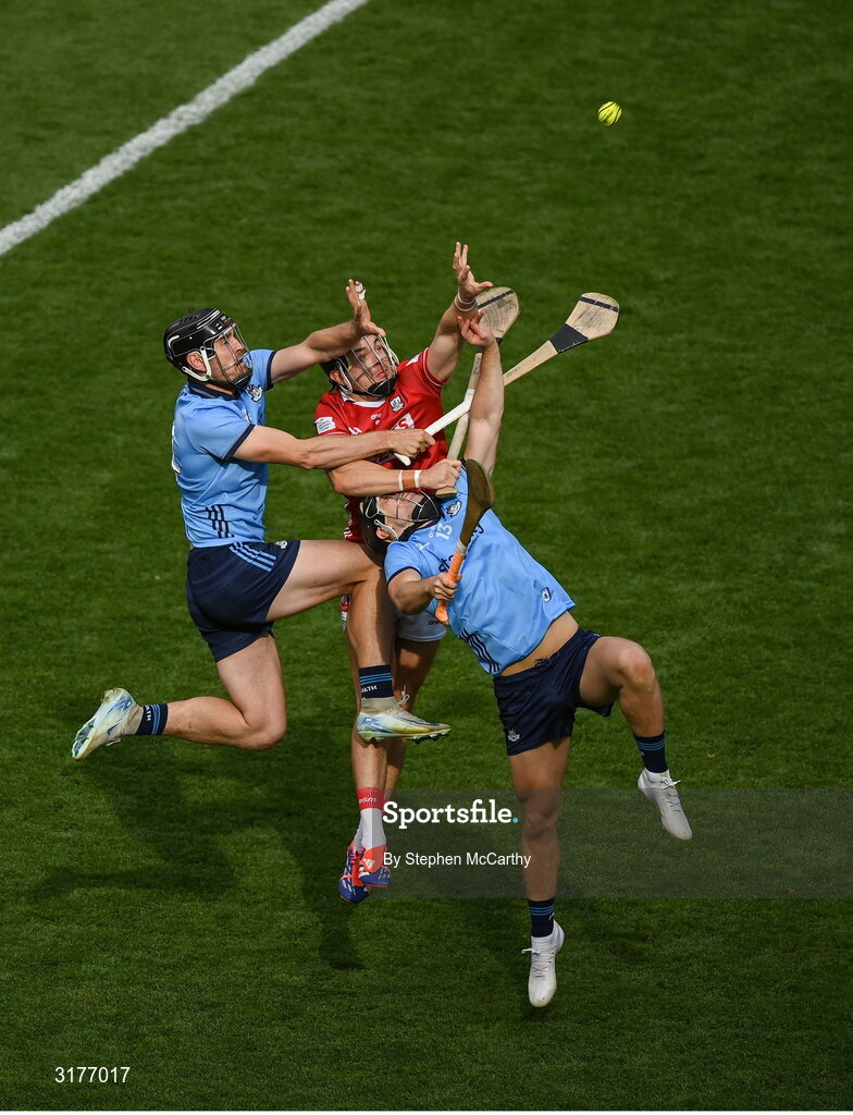 5 July 2025; Mark Coleman of Cork in action against Sean Currie, right, and Ronan Hayes of Dublin  during the GAA Hurling All-Ireland Senior Championship semi-final match between Cork and Dublin at Croke Park in Dublin. Photo by Stephen McCarthy/Sportsfile