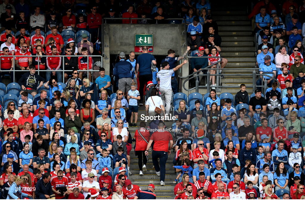 5 July 2025; Dublin and Cork supporters leave the stadium before the end of the GAA Hurling All-Ireland Senior Championship semi-final match between Cork and Dublin at Croke Park in Dublin. Photo by Stephen McCarthy/Sportsfile