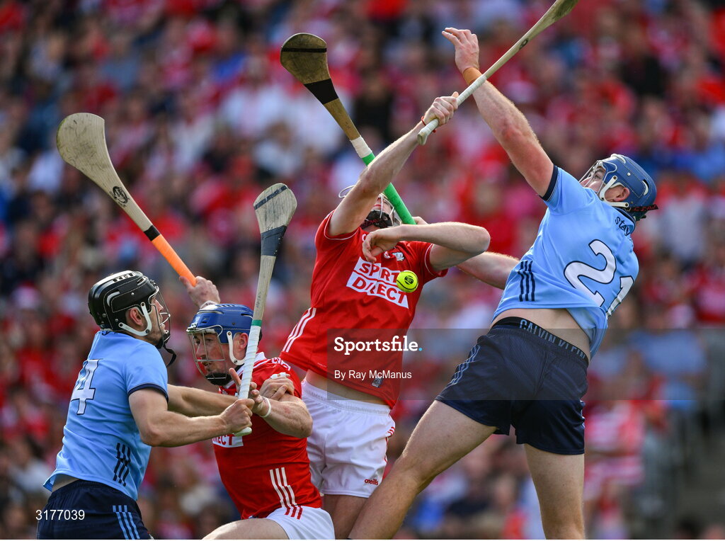 5 July 2025; Dublin players Ronan Hayes and John Hetherton, 21, contest a dropping sliorar with Cork defenders Seán O'Donoghue and Eoin Downey during the GAA Hurling All-Ireland Senior Championship semi-final match between Cork and Dublin at Croke Park in Dublin. Photo by Ray McManus/Sportsfile
