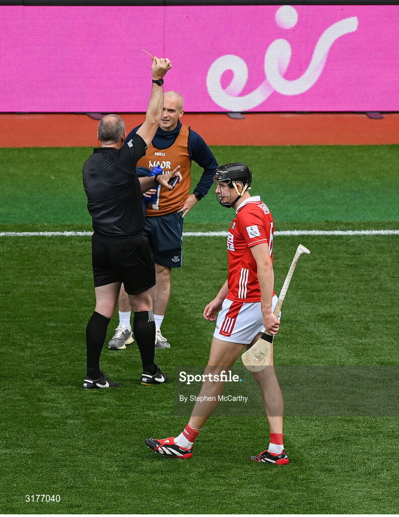 5 July 2025; Dublin maor uisce David O'Callaghan is shown a yellow card by referee Johnny Murphy during the GAA Hurling All-Ireland Senior Championship semi-final match between Cork and Dublin at Croke Park in Dublin. Photo by Stephen McCarthy/Sportsfile