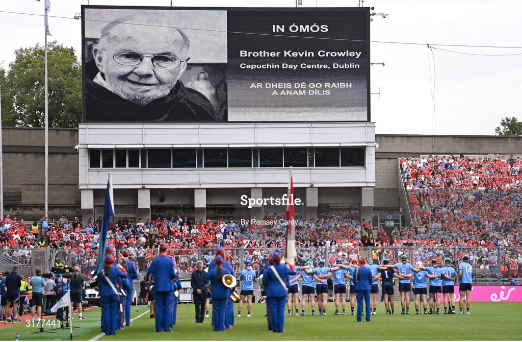 5 July 2025; The late Br. Kevin Crowley of the Capuchin Day Centre is displayed on the screen during a minutes silence before the GAA Hurling All-Ireland Senior Championship semi-final match between Cork and Dublin at Croke Park in Dublin. Photo by Ramsey Cardy/Sportsfile