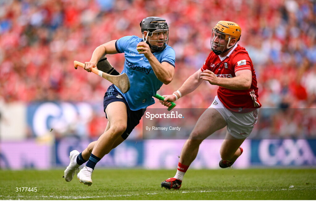 5 July 2025; Sean Currie of Dublin in action against Niall O'Leary of Cork during the GAA Hurling All-Ireland Senior Championship semi-final match between Cork and Dublin at Croke Park in Dublin. Photo by Ramsey Cardy/Sportsfile