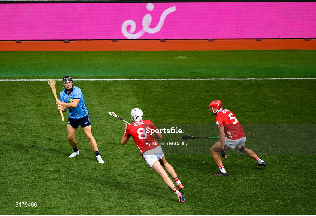 5 July 2025; Sean Currie of Dublin in action against Tim O'Mahony, 8, and Ciarán Joyce of Cork during the GAA Hurling All-Ireland Senior Championship semi-final match between Cork and Dublin at Croke Park in Dublin. Photo by Stephen McCarthy/Sportsfile