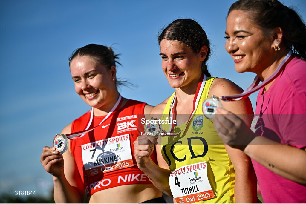 9 July 2025; Nicola Tuthill of Ireland after winning gold, centre, alongside Beatrice Llano of Norway, right, who won silver, and Suvi Koskinen of Finland, left, who won bronze, in the Inspire (Credit Union) Women's Hammer during the Cork City Sports meet at MTU Arena in Cork. Photo by Sam Barnes/Sportsfile