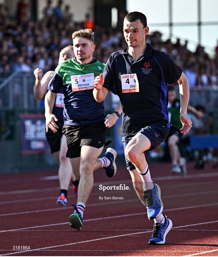 9 July 2025; Paul Colgan of Muskerry Special Olympics Club, right, on his way to winning the Cork City Council Special Olympics 100m alongside Calvin Brosnan of Tralee Together Special Olympics Club, who finished second, during the Cork City Sports meet at MTU Arena in Cork. Photo by Sam Barnes/Sportsfile
