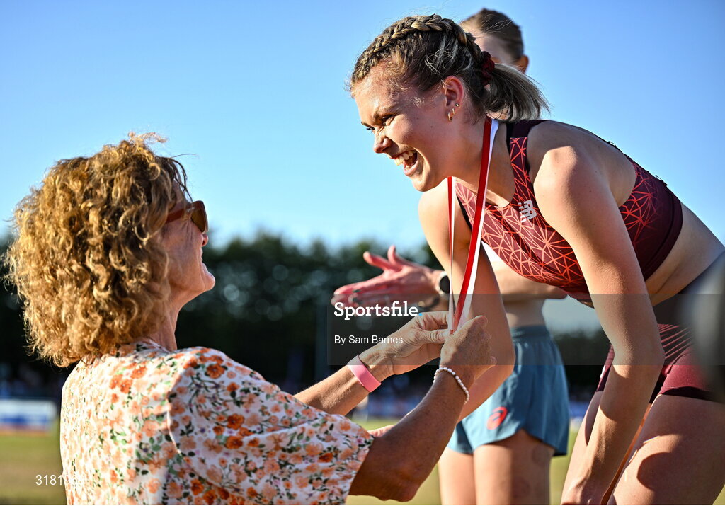 9 July 2025; Megan Keith of Great Britain, right, is presented with her gold medal by Olympian Sonia O'Sullivan after winning the PJ Hegarty Women's 3000m during the Cork City Sports meet at MTU Arena in Cork. Photo by Sam Barnes/Sportsfile