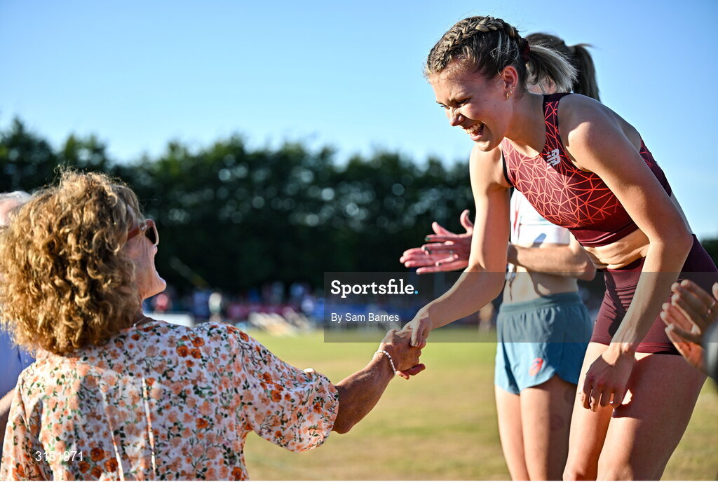 9 July 2025; Megan Keith of Great Britain, right, is presented with her gold medal by Olympian Sonia O'Sullivan after winning the PJ Hegarty Women's 3000m during the Cork City Sports meet at MTU Arena in Cork. Photo by Sam Barnes/Sportsfile