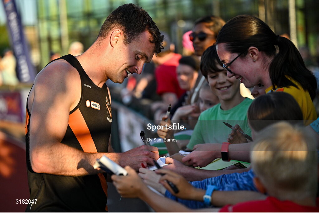 9 July 2025; Marcus Lawler of Ireland signs autographs for supporters after competing in the CETB Men's 200m Race during the Cork City Sports meet at MTU Arena in Cork. Photo by Sam Barnes/Sportsfile